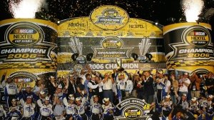 Jimmie Johnson sharing his success with the entire team after winning the 2006 NASCAR Nextel Cup Championship.