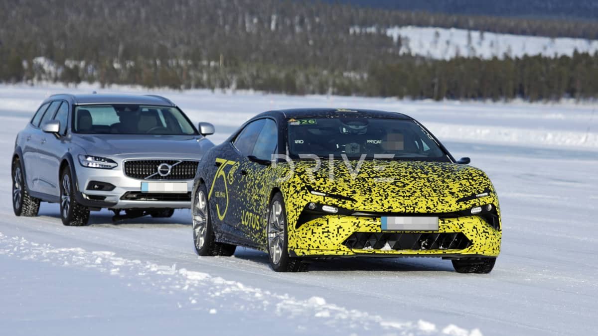 Upcoming Lotus electric sedan spied on a tow truck in the Arctic