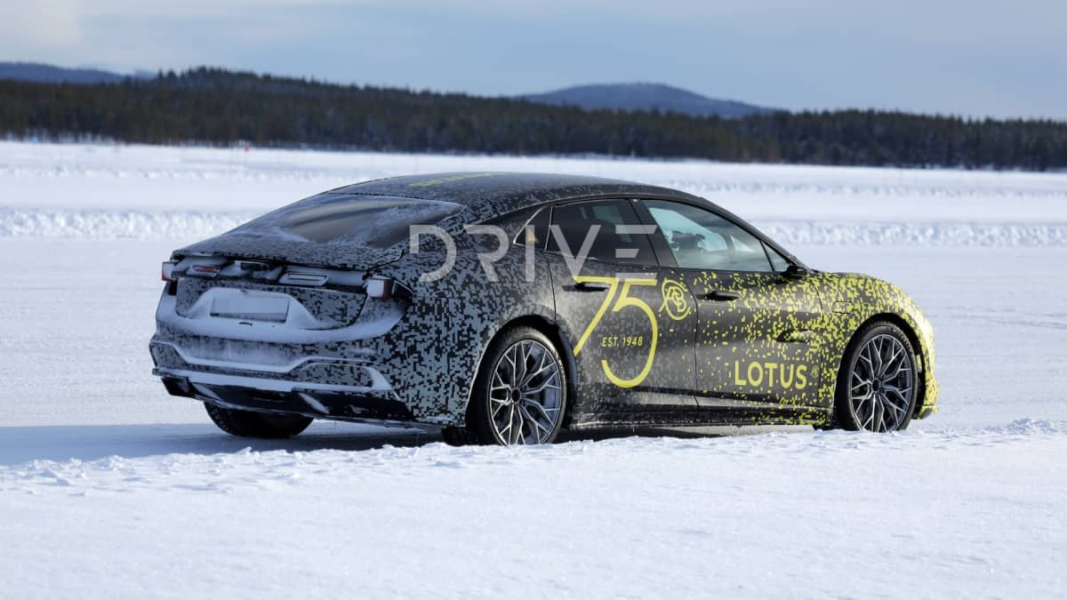 Upcoming Lotus electric sedan spied on a tow truck in the Arctic