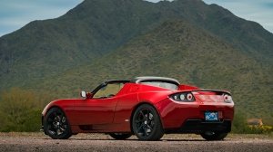 A rear 3/4 view of the 2011 Tesla Roadster 2.5 Sport