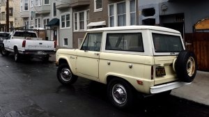 An old Ford Bronco on a street in San Francisco.