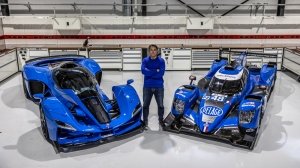 Delage CEO Laurent Tapie stands between the marque's D12 hypercar (left) and Idec Sport's LMP2 racer, the latter of which will be campaigned in partnership with Delage.