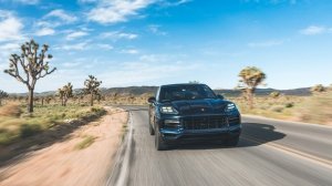 The 2024 Porsche Cayenne E-Hybrid in Algarve Blue Metallic.