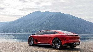 The Aehra Sedan concept in front of a mountain