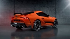 A rear 3/4 view of the 2024 Toyota GR Supra 45th Anniversary Edition