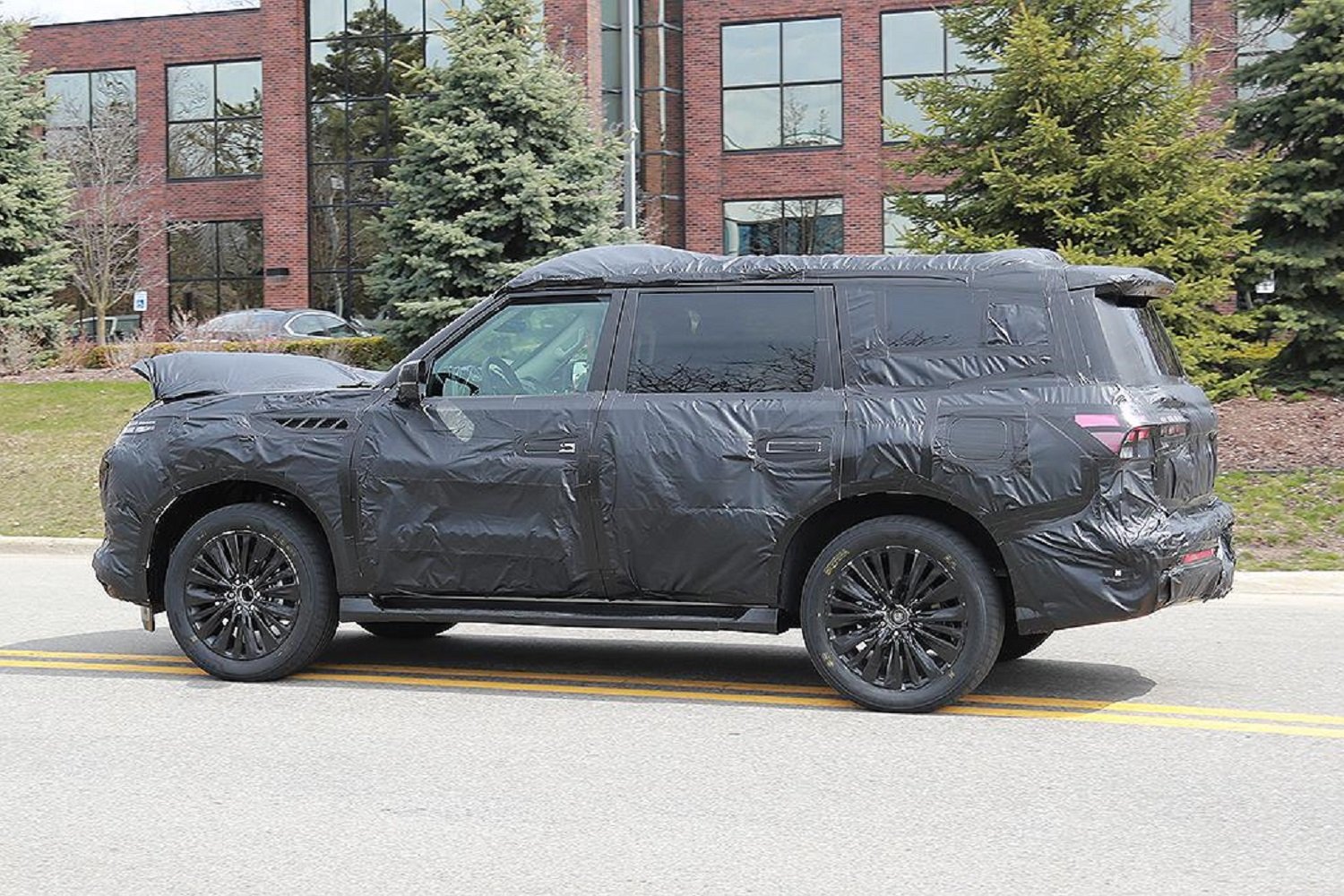Infiniti QX80 spied as hint of next generation Nissan Patrol