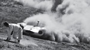 George Grinzewitsch’s Cooper Monaco misses a turn and chases a corner worker up the hill at a sports-car race in California, circa late 1950s or early 1960s. No one was hurt.