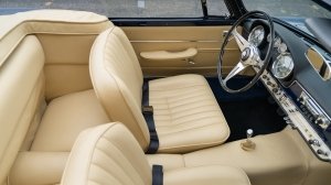 The interior of a 1960 Maserati 3500 GT Spider.