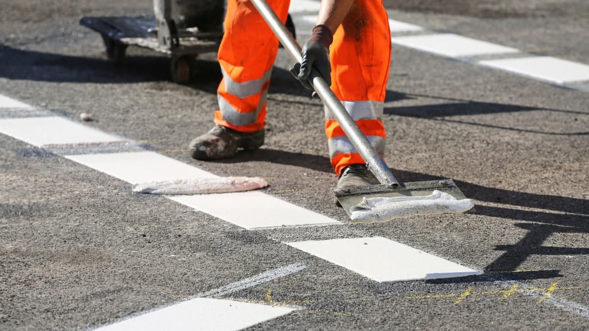 Angry residents paint squiggly lines on the road to confuse speeders