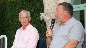 Greg Maffei, CEO of Liberty Media, listens to Zak Brown, CEO of McLaren Racing, during a past Excellence in Motion panel.