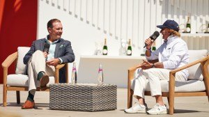 Formula 1 and Indy champion Emerson Fittipaldi (right) in conversation with Maurice Merrick of the Horsepower Heritage podcast, at the Quail, a Motorsport Gathering 2023.