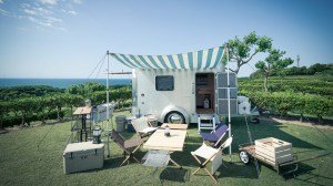 X-Cabin300 travel trailer with a canopy attached