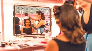 An on-site beautician facilitates a classic makeover at the 2023 Goodwood Revival.