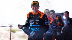 McLaren's F1 driver Oscar Piastri celebrates his third-place finish at the 2023 Japanese Grand Prix.