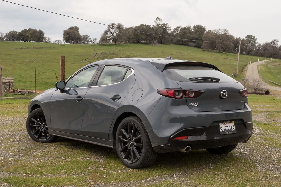 04-mazda-mazda3-2019-angle--exterior--grey--rear.jpg