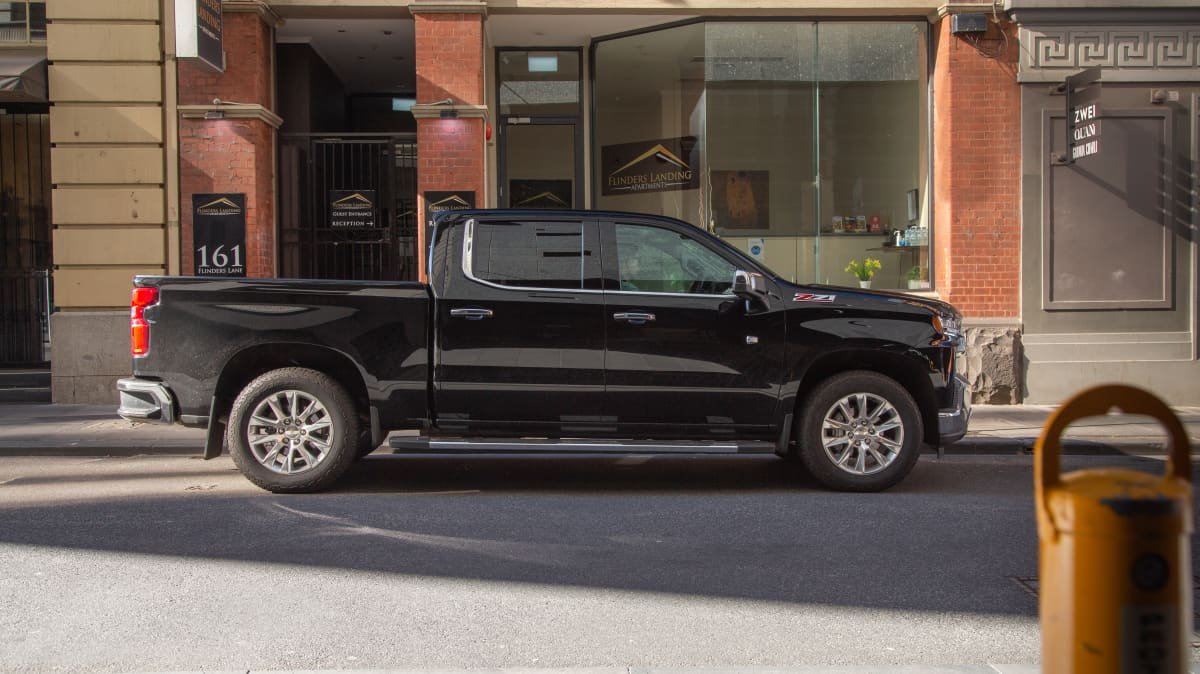 2021 Chevrolet Silverado 1500 LTZ Premium v 2022 Ram 2500 Laramie comparison-0