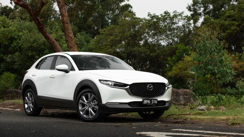 2022 Mazda CX-30 G20e Evolve Hybrid v 2022 Toyota C-HR GR Sport hybrid comparison-0