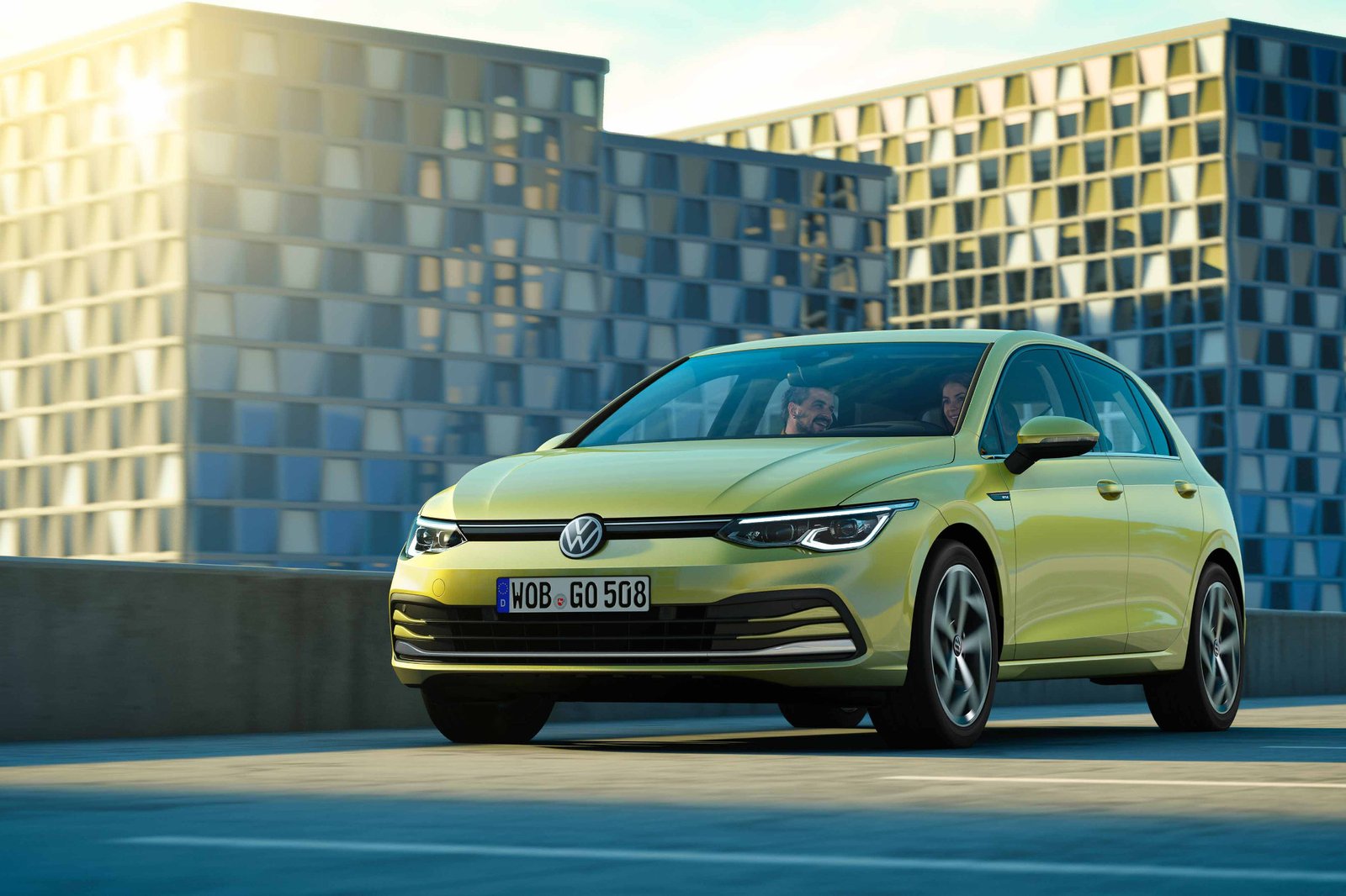 volkswagen-golf-a8-european-model--02-angle--exterior--front--green--urban.jpg