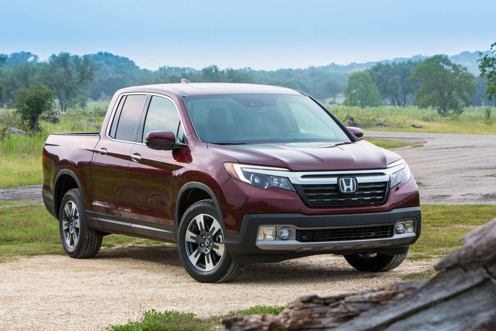 honda-ridgeline-2019-01-angle-exterior-front-off-road-red