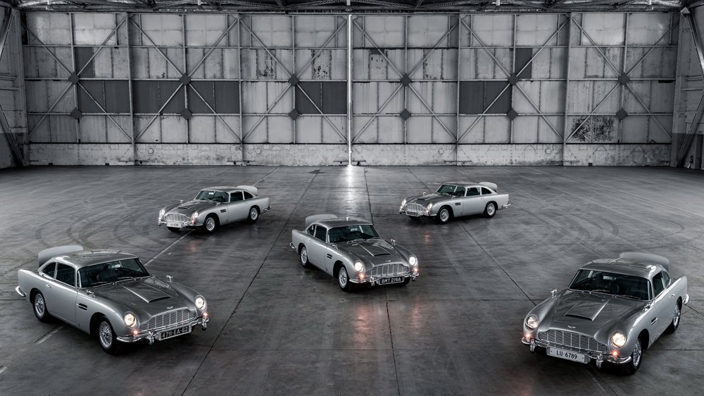 Aston Martin photographs five of its DB5 Goldfinger Continuation cars together.