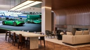 The Q New York flagship customization center's giant LED display and sitting area