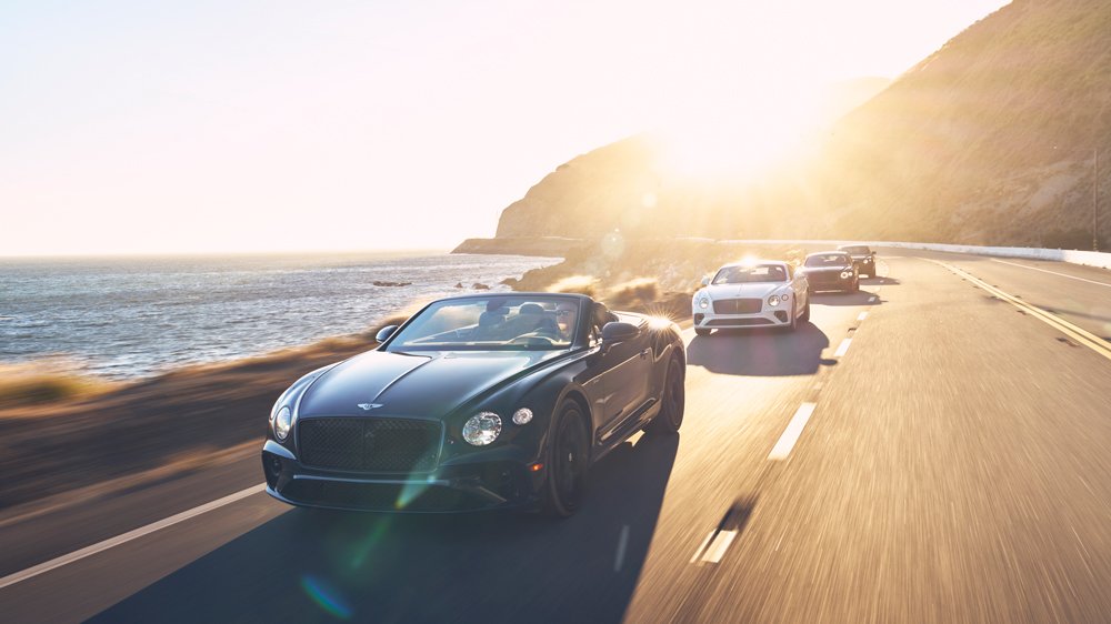 Speed variants from the current Bentley model lineup power along Pacific Coast Highway in Malibu.