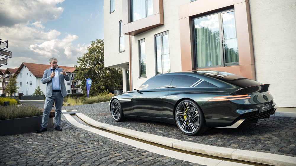 Genesis CCO Luc Donckerwolke with the Genesis X Speedium Coupe concept car in Germany.
