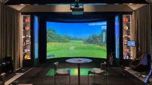 The HD Golf Simulator set up in a den