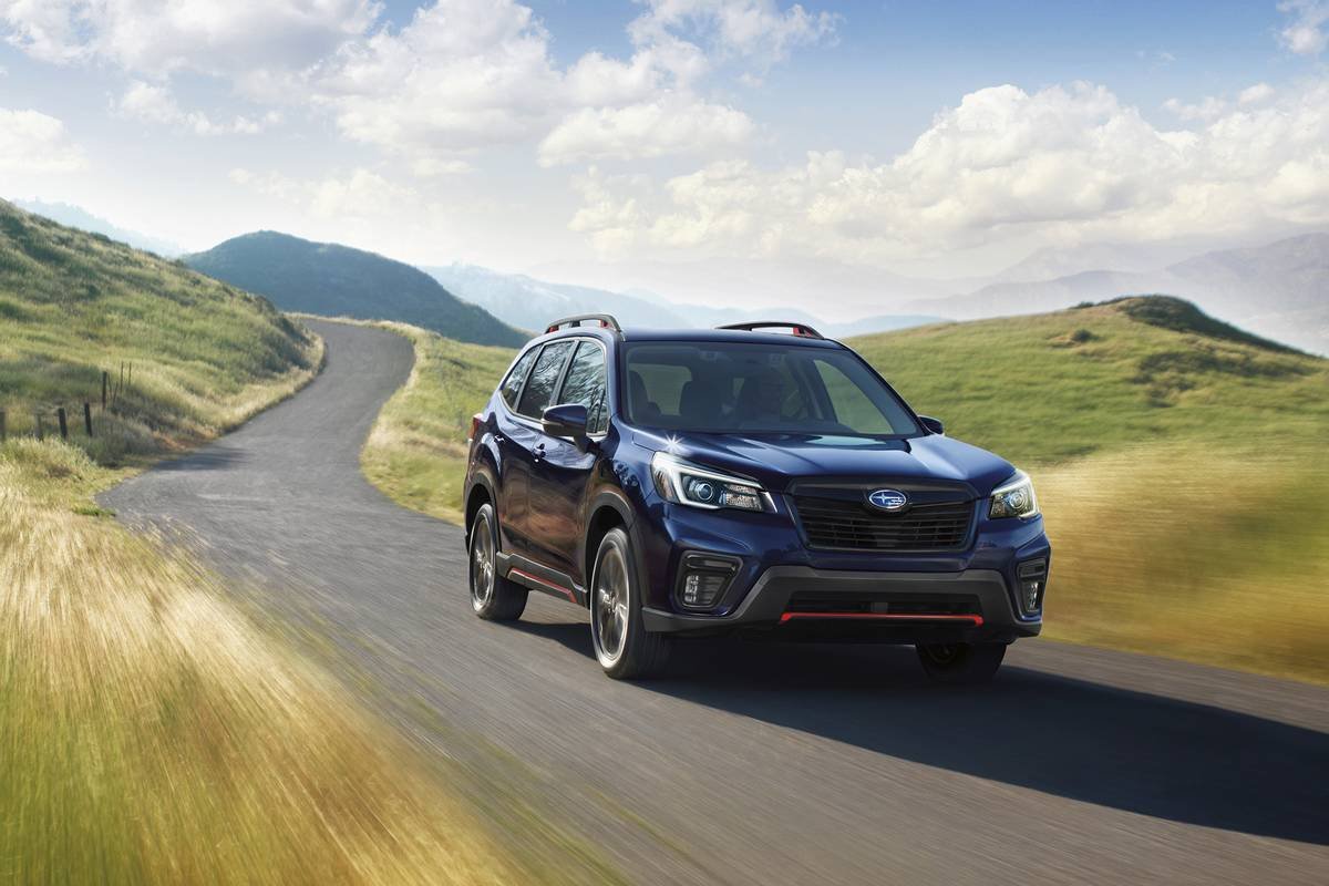 A 2021 Subaru Forester driving on a road