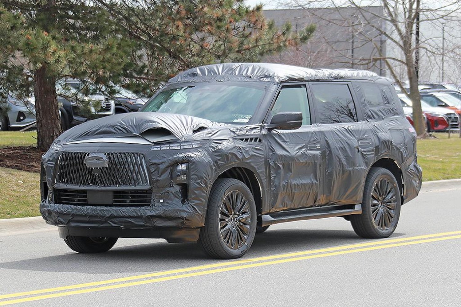Infiniti QX80 spied as hint of next generation Nissan Patrol