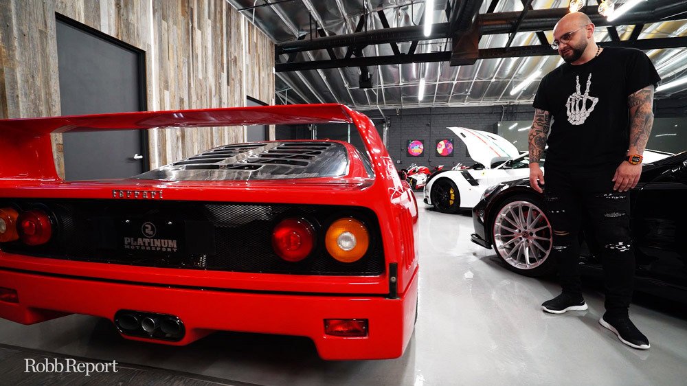 Edvin Ovasapyan admiring his Ferrari F40.