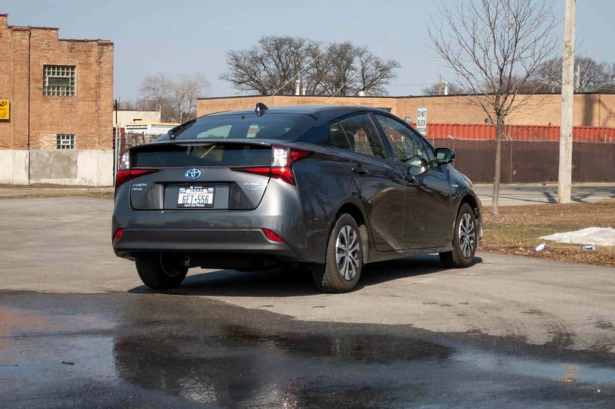 toyota-prius-xle-awd-2021-04-angle--exterior--gray--rear.jpg