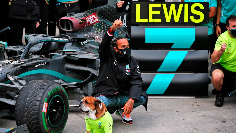 Lewis Hamilton and his dog Roscoe after locking up the World Drivers' Championship title in 2020.