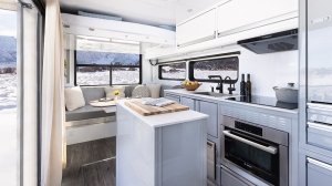 Inside the Living Vehicle HD's residential-style kitchen with an indoor-outdoor design. 