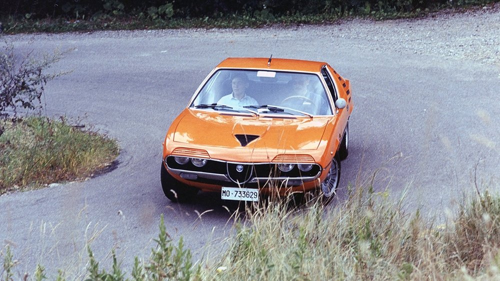 Luca Serafini and his father in the elder's Alfa Romeo Montreal