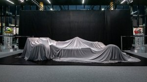 Mario Andretti's 1978 John Player Special Lotus-Cosworth Type 79 race car under wraps prior to a presentation by Bonhams on January 31, 2023.