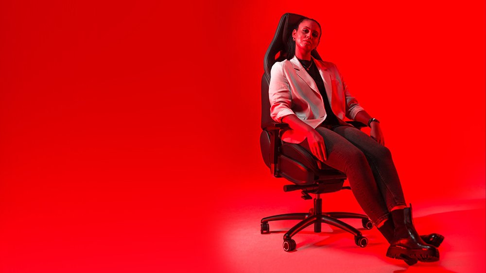 A woman sits in Mercedes-AMG's office chair