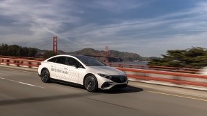 A Mercedes-Benz EQS sedan equipped with drive pilot on a road in California