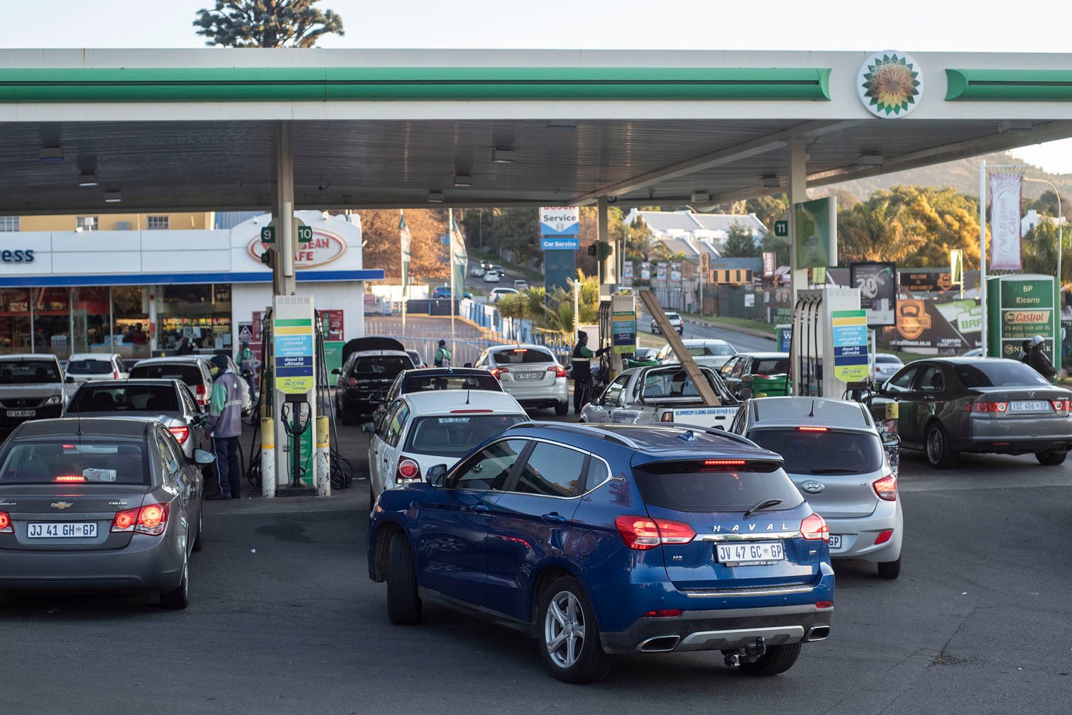 cars queue at petrol station