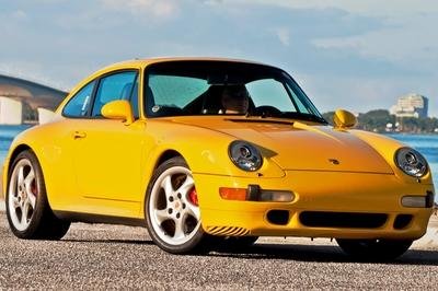  The last of the air-cooled models, the 911 (993) remains an icon to this very day. Check out our historical review at TopSpeed.com.
