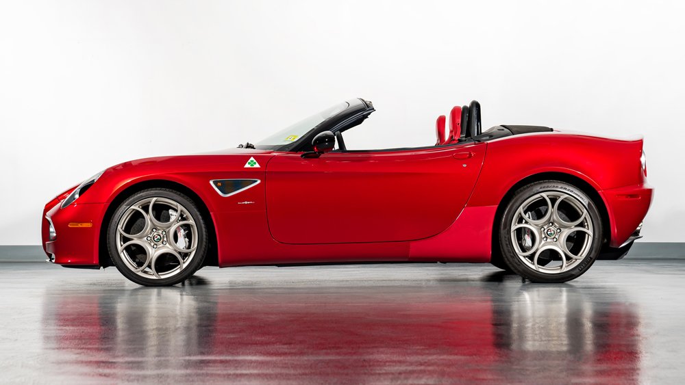 The profile view of a 2009 Alfa Romeo 8C Spider.
