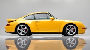 A 1996 Porsche 911 Turbo in Speed Yellow.