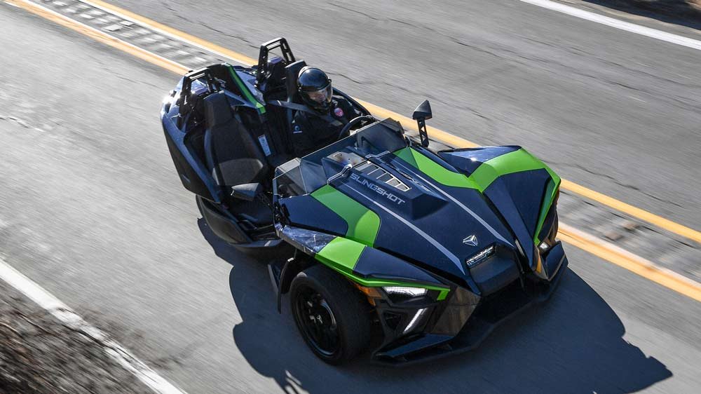 The 2021 Polaris Slingshot SL on a canyon road above Malibu.