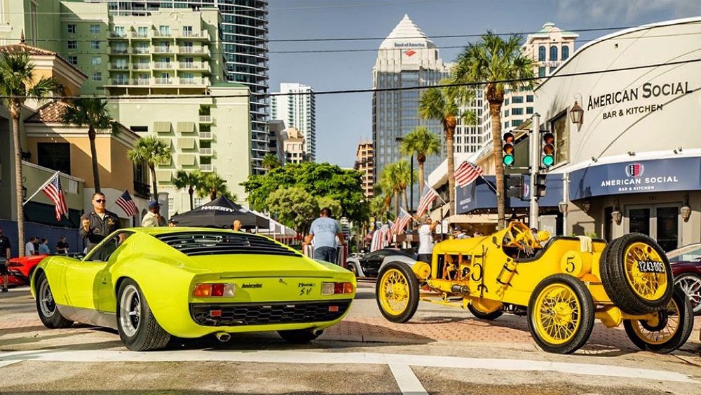A Lamborghini Miura and a vintage race car at the Exotics on Las Osas car show in Fort Lauderdale.