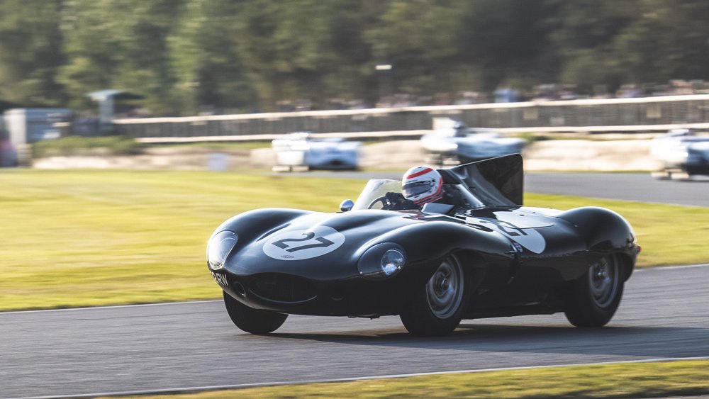 A classic Jaguar D-type competes at the 2021 Goodwood Revival.