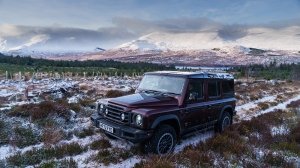 Ineos Grenadier on snowy landscape