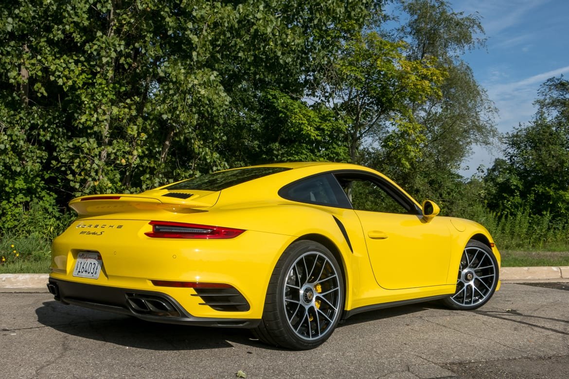 03-porsche-911-turbo-s-2018-exterior--rear-angle--yellow.jpg