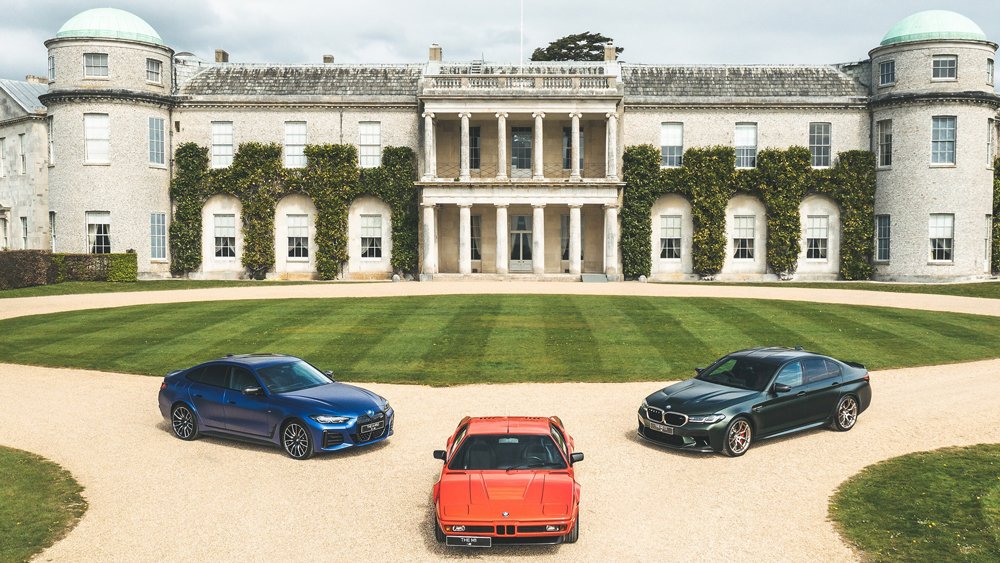 BMW models in front of Goodwood House.